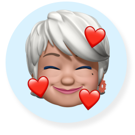 หน้า Memoji กำลังยิ้มและชูสองนิ้ว