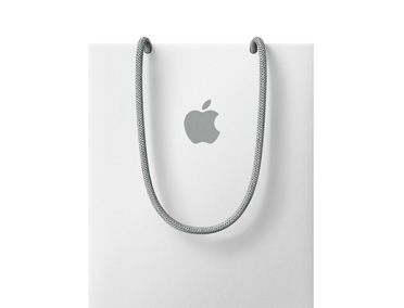 En hvit Apple-handlebag med Apple-logo nær toppen vises.